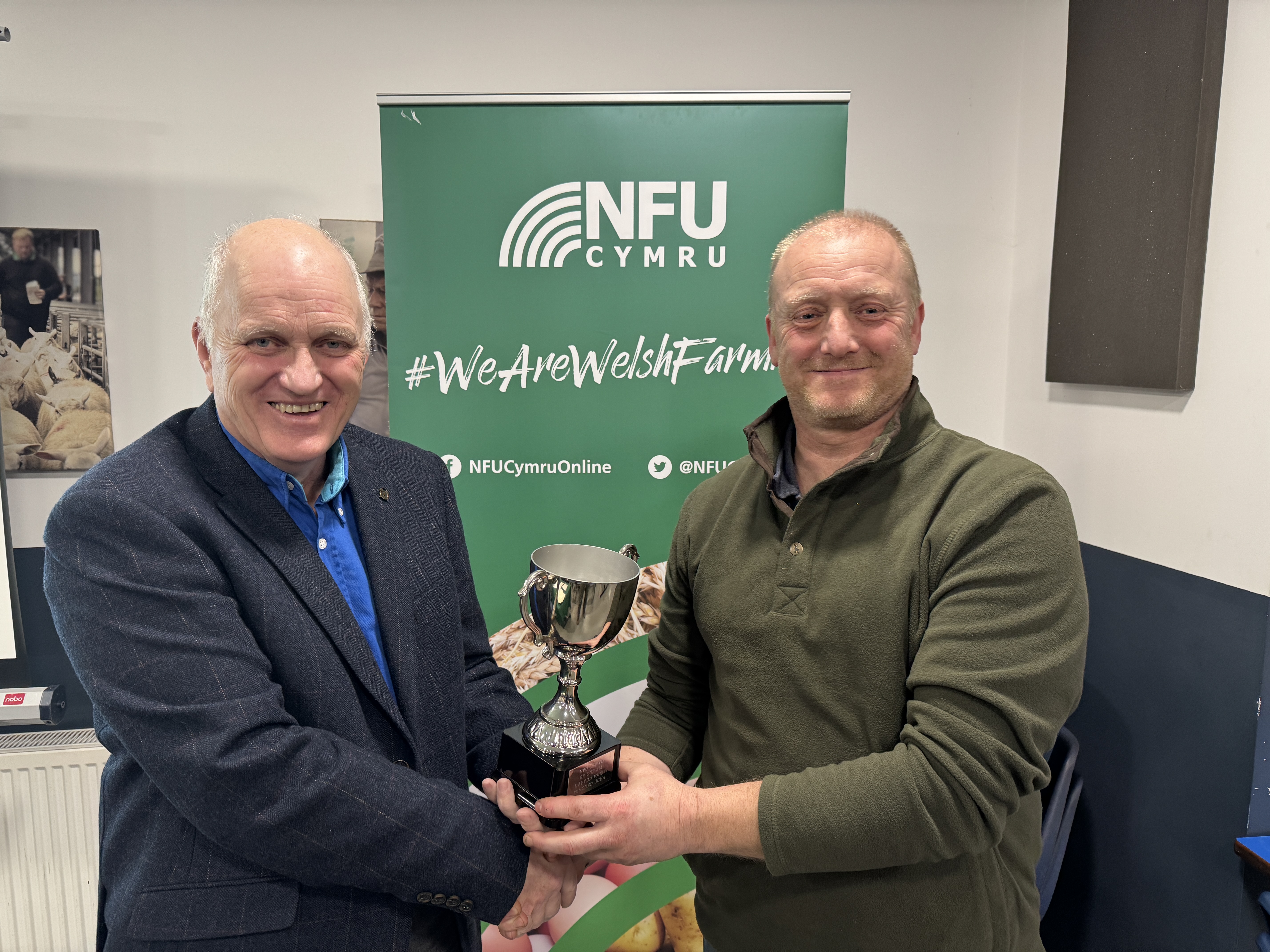 NFU Cymru Clwyd County Chairman David Williams presents Paul Williams with the NFU Cymru Clwyd Dafydd Jones Memorial Award